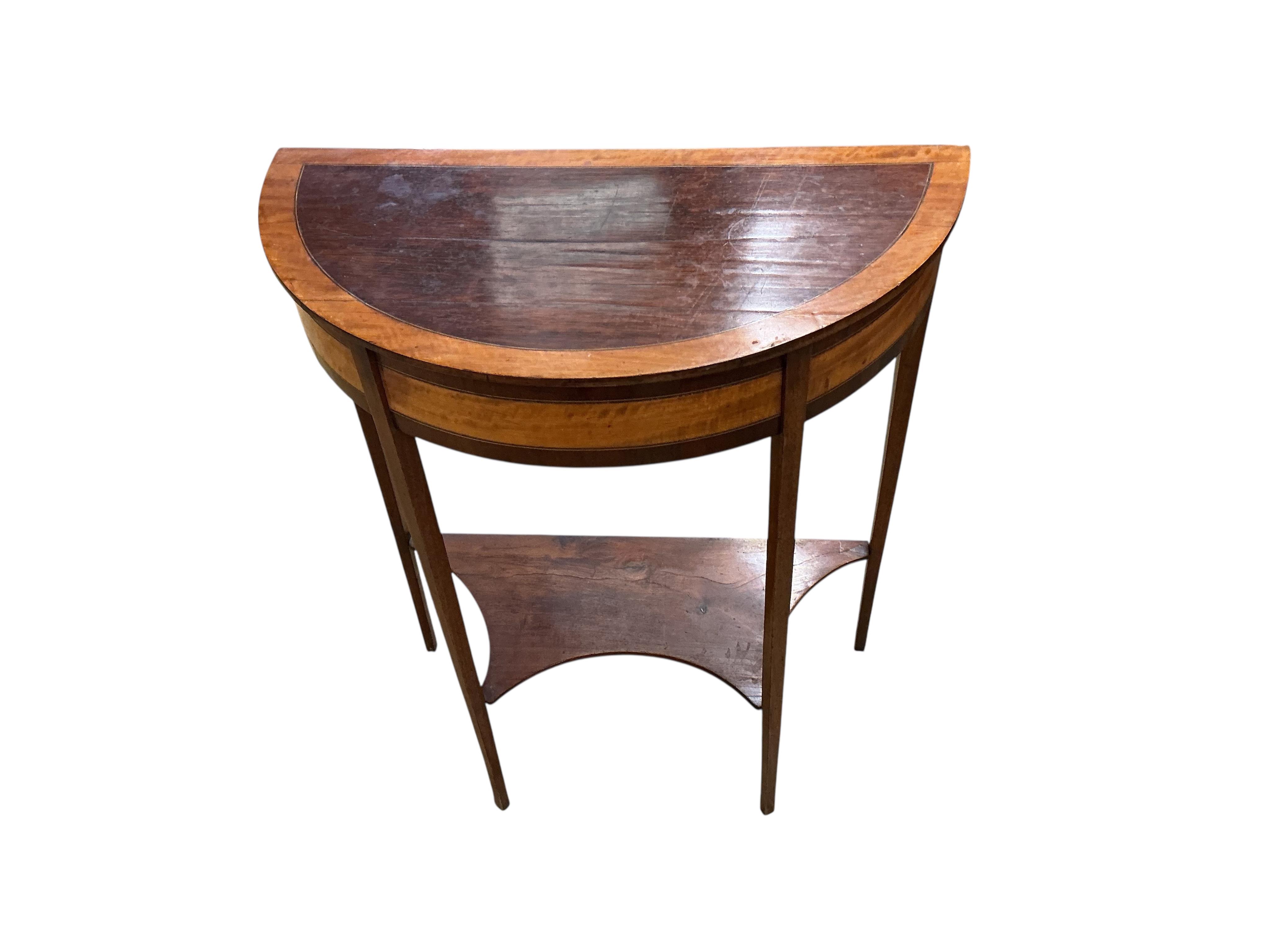 A George III style satinwood banded inlaid demi-lune two tier table, width 64cm, depth 32cm, height 77cm